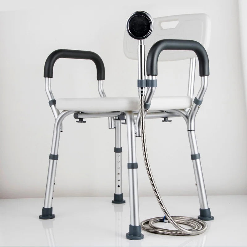 Adaptive Convertible Shower Seat with anti-skid feet and shower attachment.